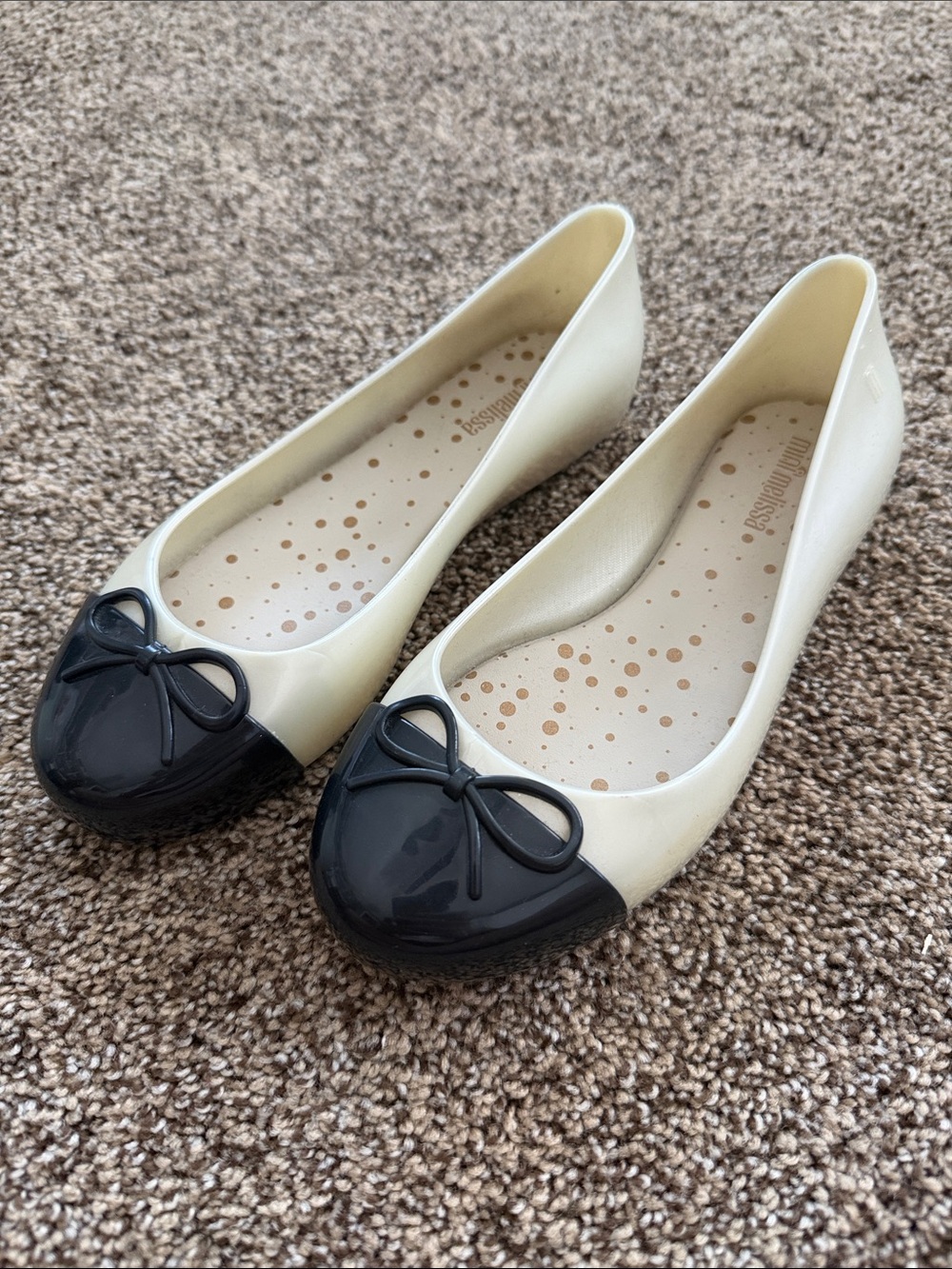 Mini Melissa Ivory Ballet Flats with Black Cap Toe and Bow